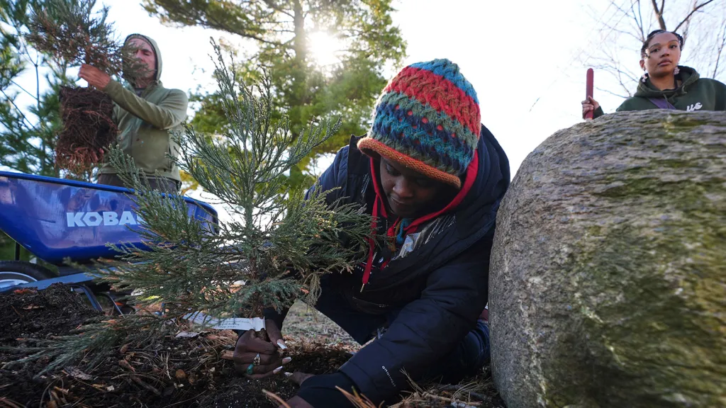 Kids plant trees, change neighborhoods