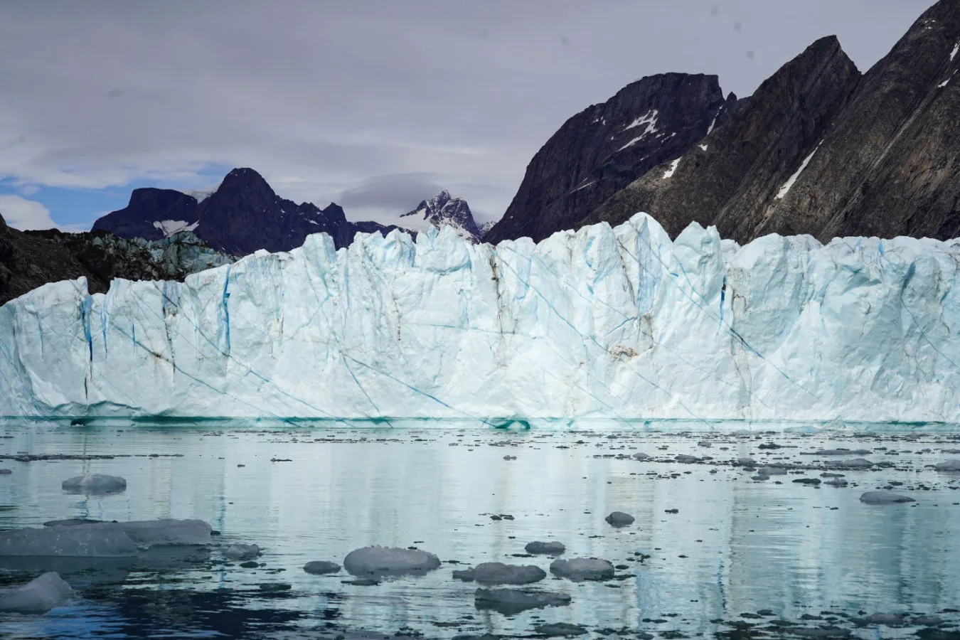 Image accompanying: Towering glacial ice cliffs may collapse in fits and starts